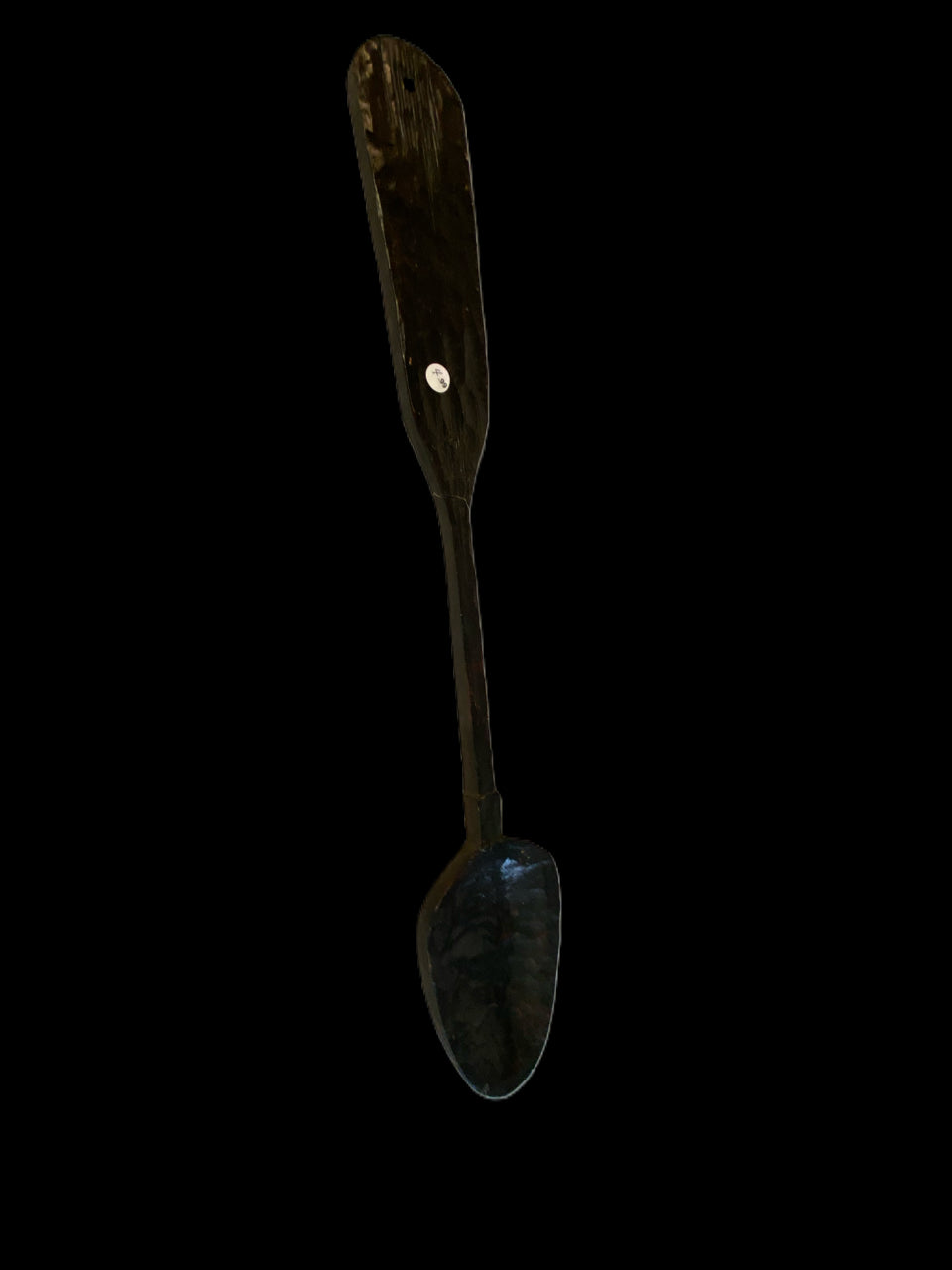 Wooden Spoon on Black Background