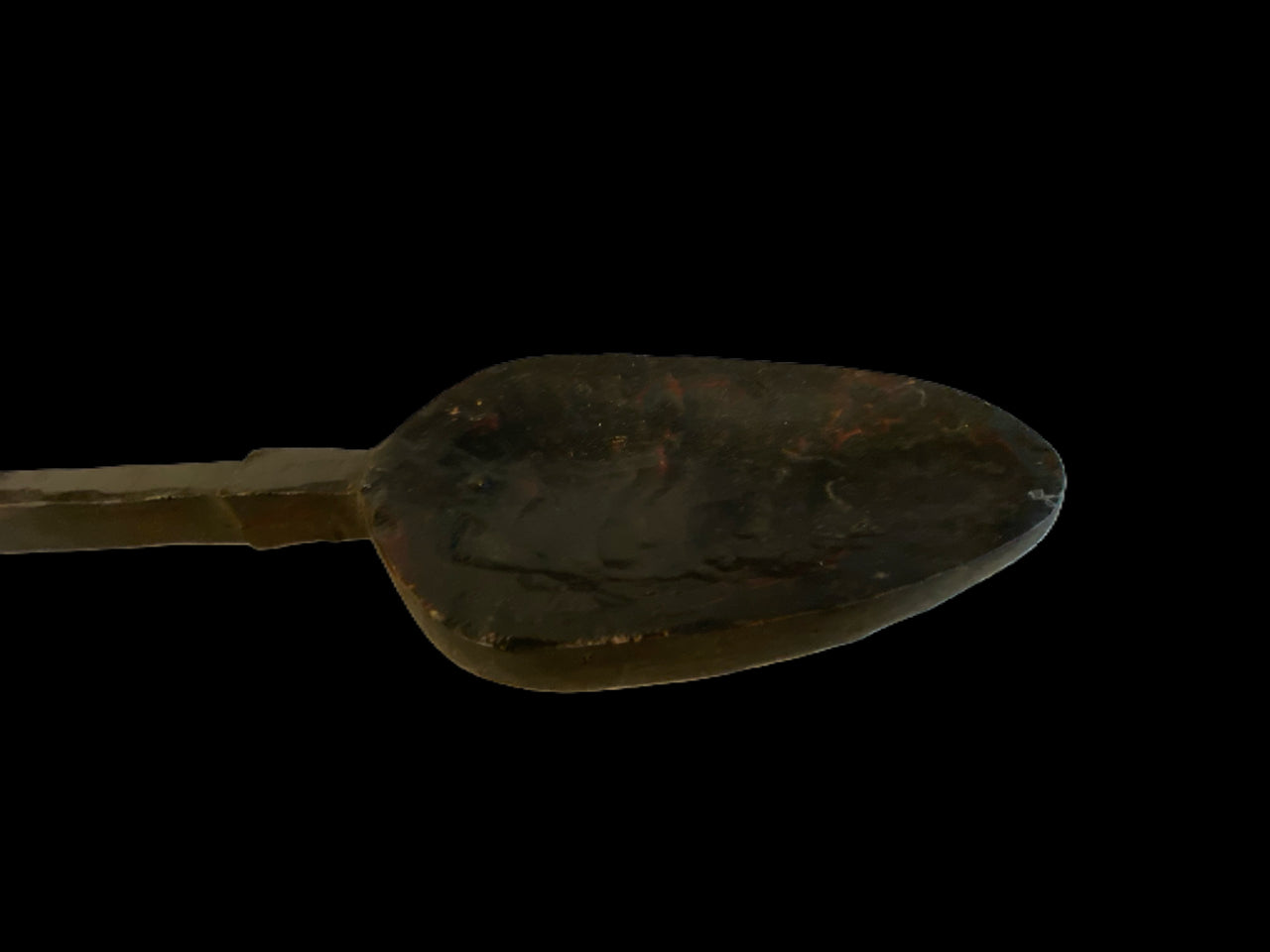 Wooden Spoon on Black Background